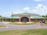 hip-roof-church-metal-building-green-metal-roof-sanctuary